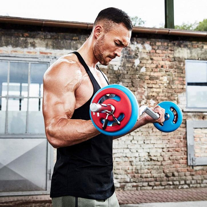 Set d'haltères incluant 2 haltères courts, une barre de curl SZ et des stop-disques - Gorilla Sports France