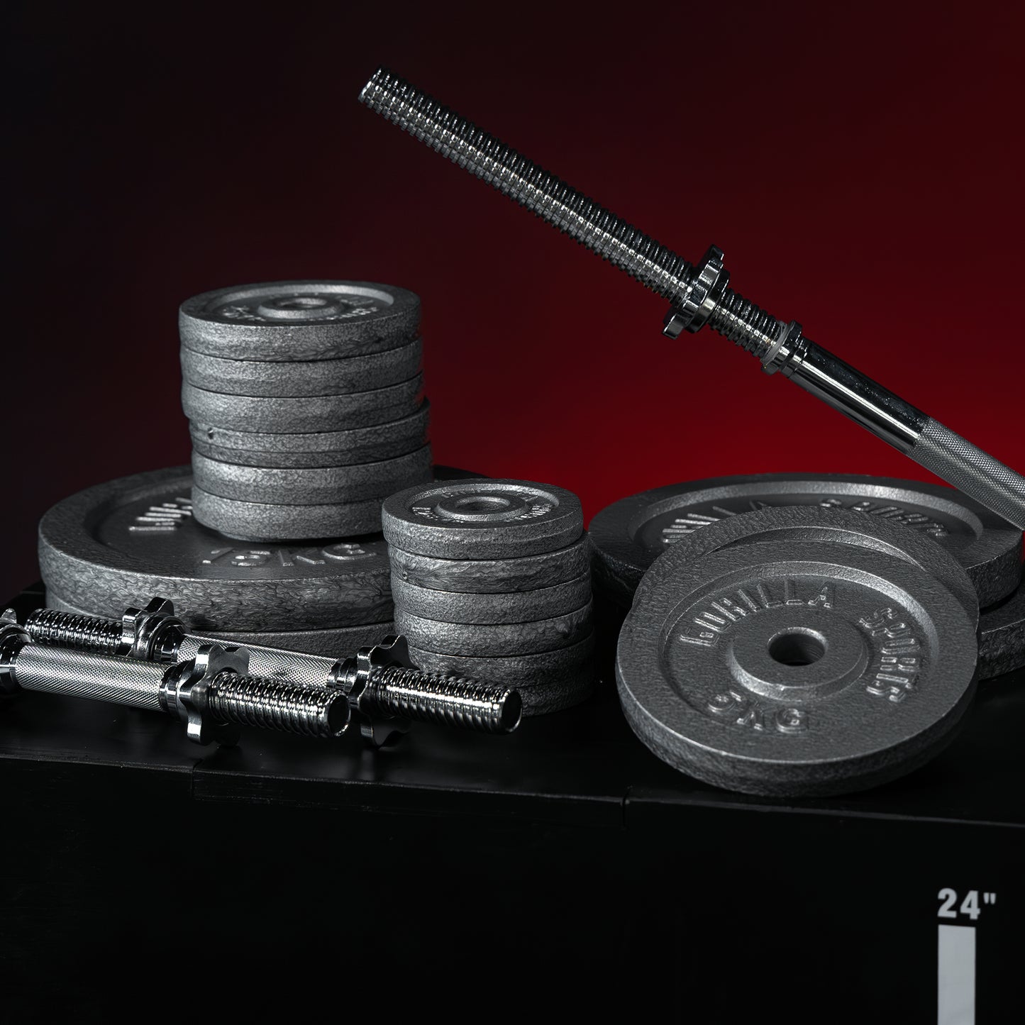 Set d'haltères et barre longue avec disques en fonte