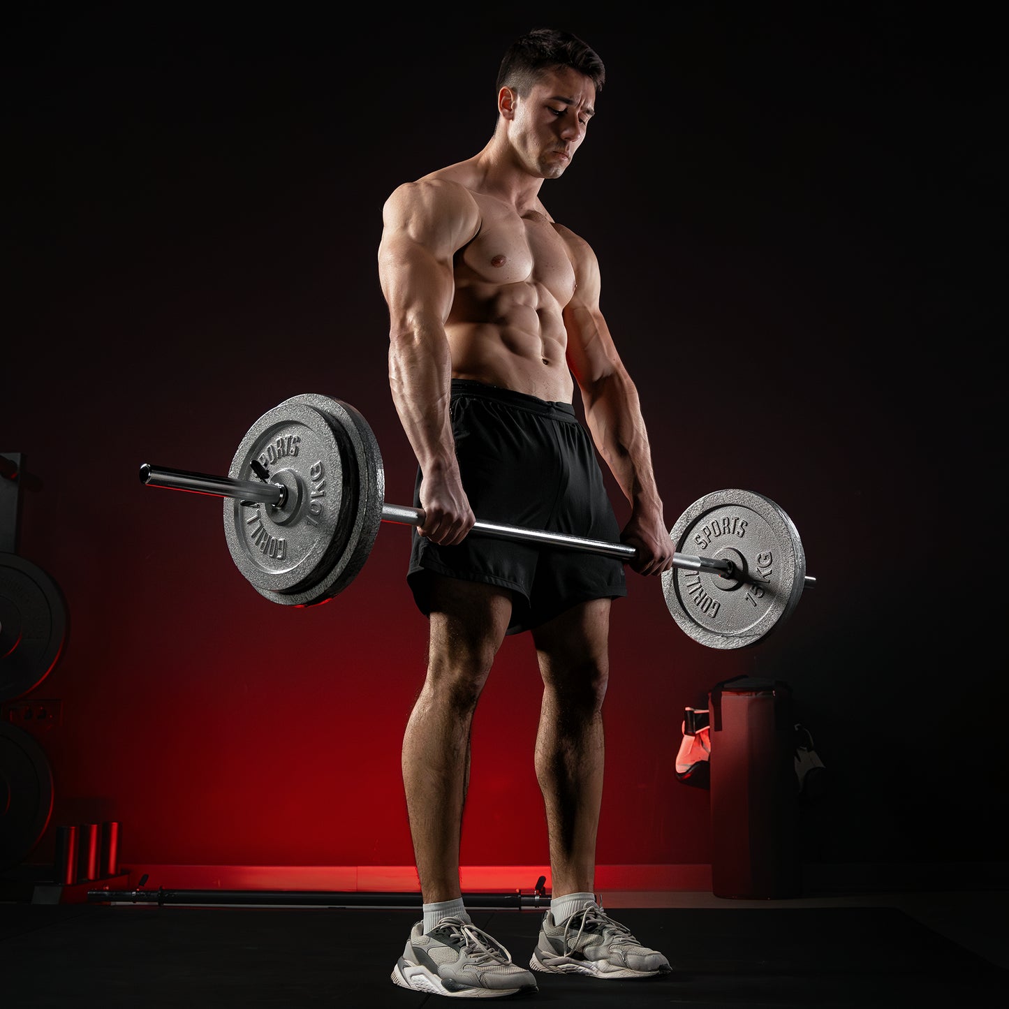 Set d'haltères en fonte 108 kg avec stop disques à ressort