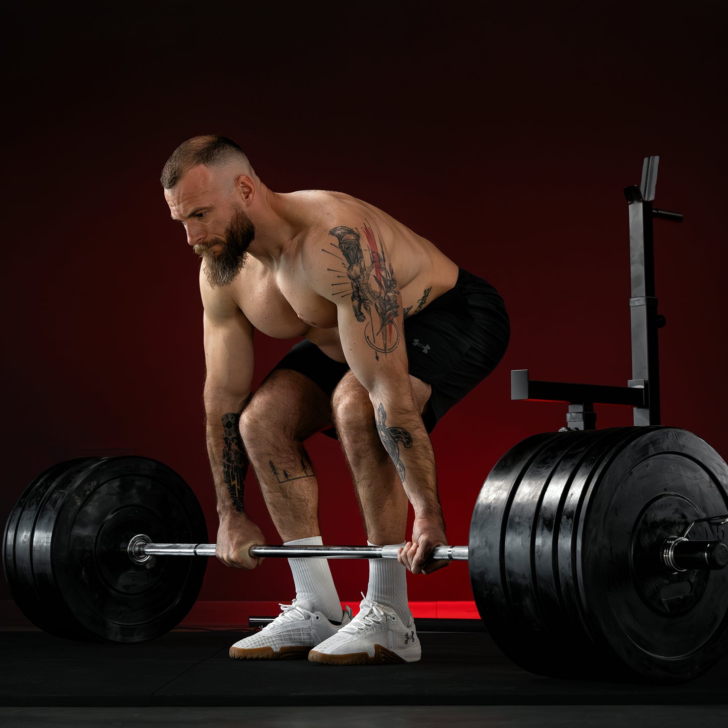 Set d'haltères longs olympiques avec rack à squat