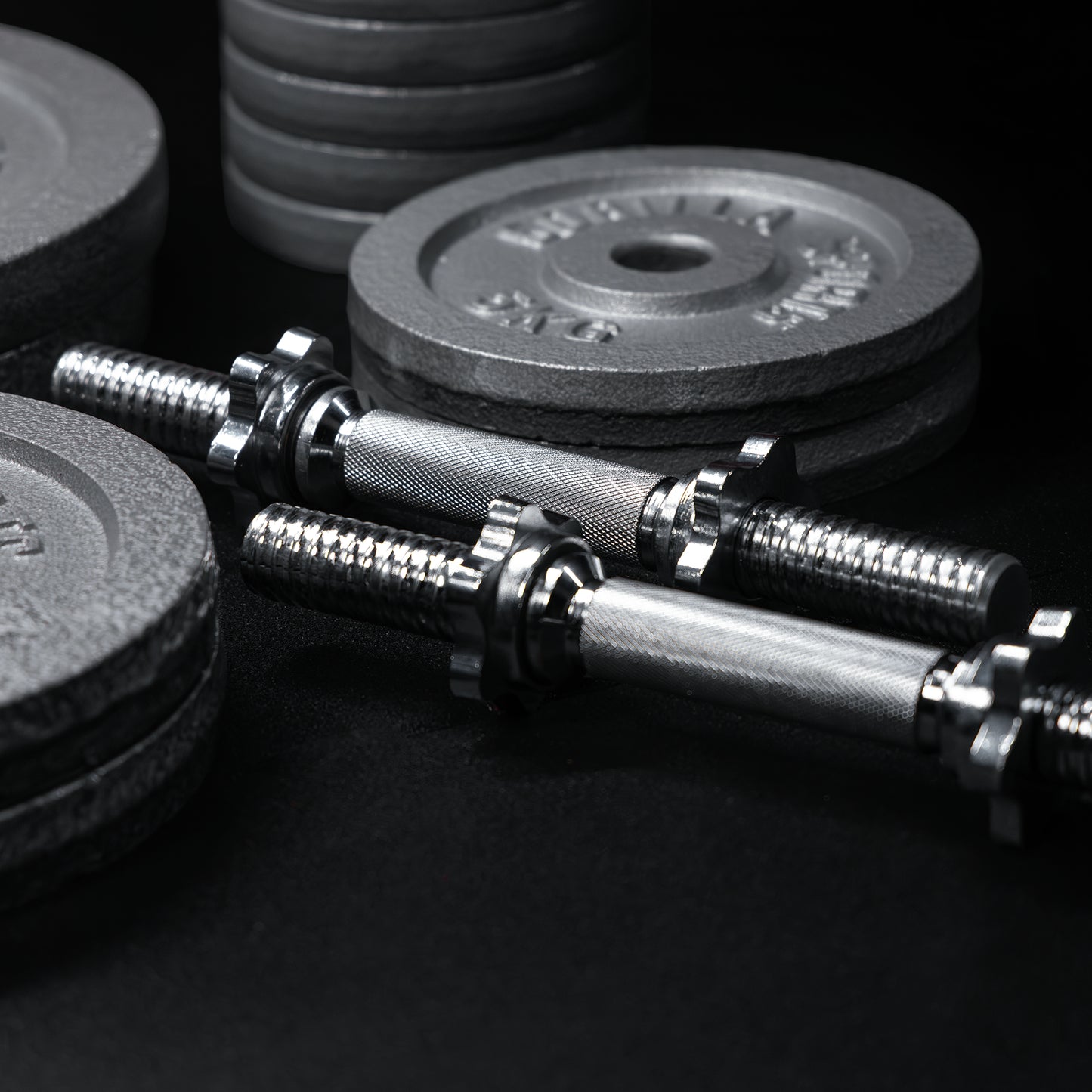 Set d'haltères en fonte 108 kg