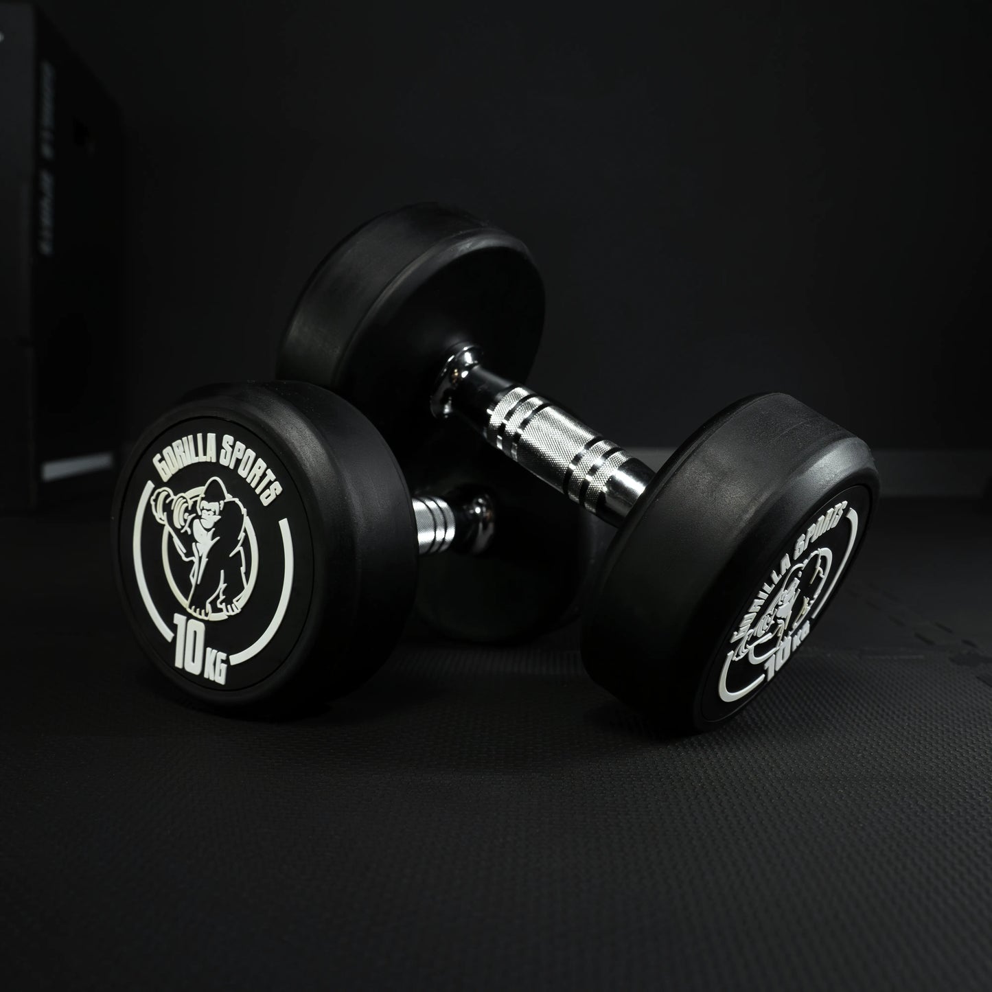 Haltère rond en caoutchouc