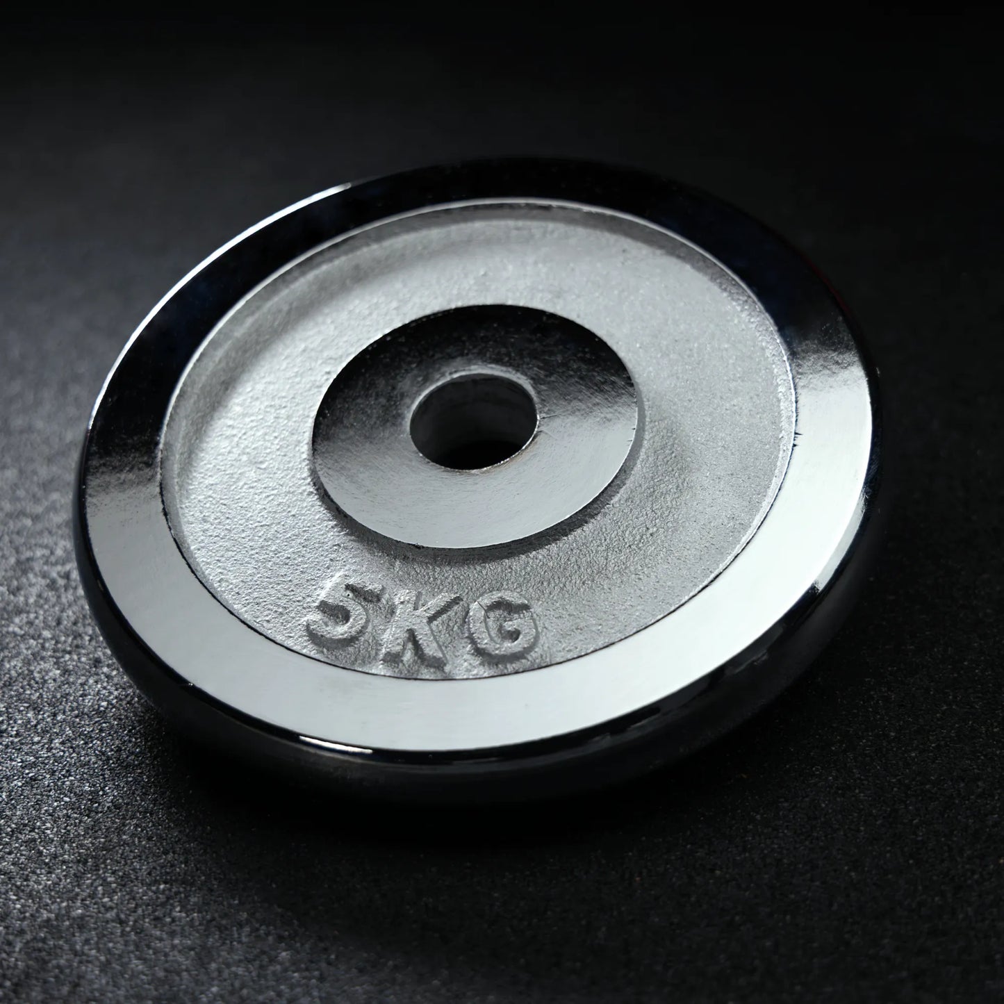 Disques de musculation en fonte chromés 30/31 mm