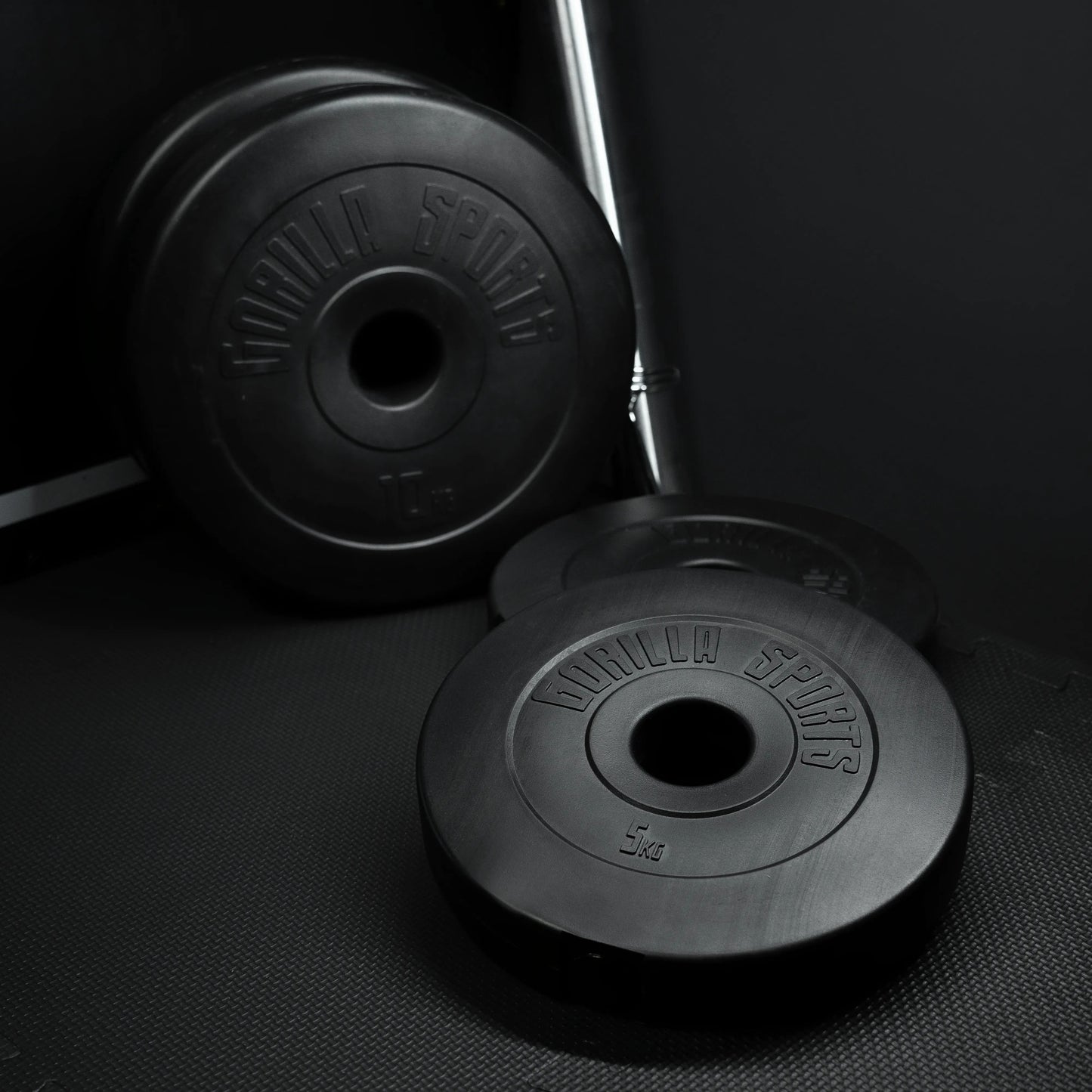 Disque musculation olympique en plastique 50/51 mm